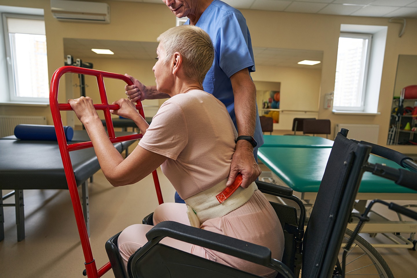 physiotherapist teaching disabled woman to use wal 2026 01 05 22 51 09 utc