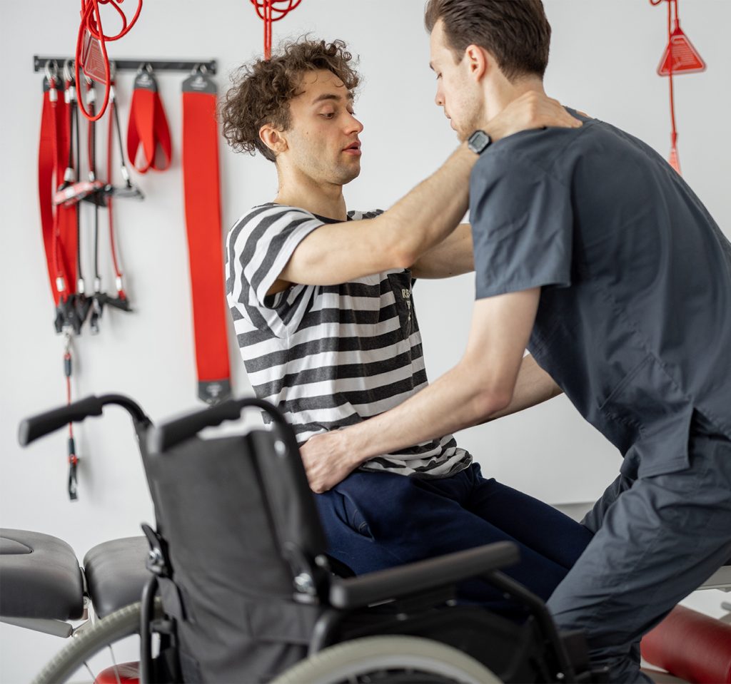 rehabilitation specialist helps man to get up from 2026 03 20 04 33 47 utc copy