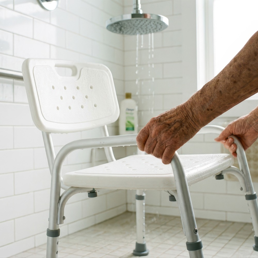 Shower safety solutions elderly concept. Elderly person Millercare